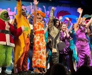 The cast of Seussical bowing to the crowd at the end of the show