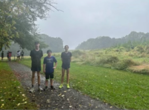 Some of Gateway's cross country members working in bad weather