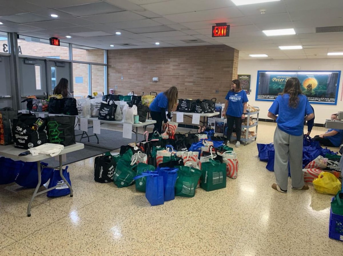 Students organizing food at a previous food drive