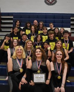 2023-24 Color Guard and Percussion at Eastern Regional High School for Regionals, sporting gold medals.