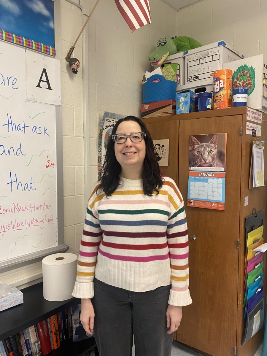 Ms. Desmond in her classroom getting ready before school