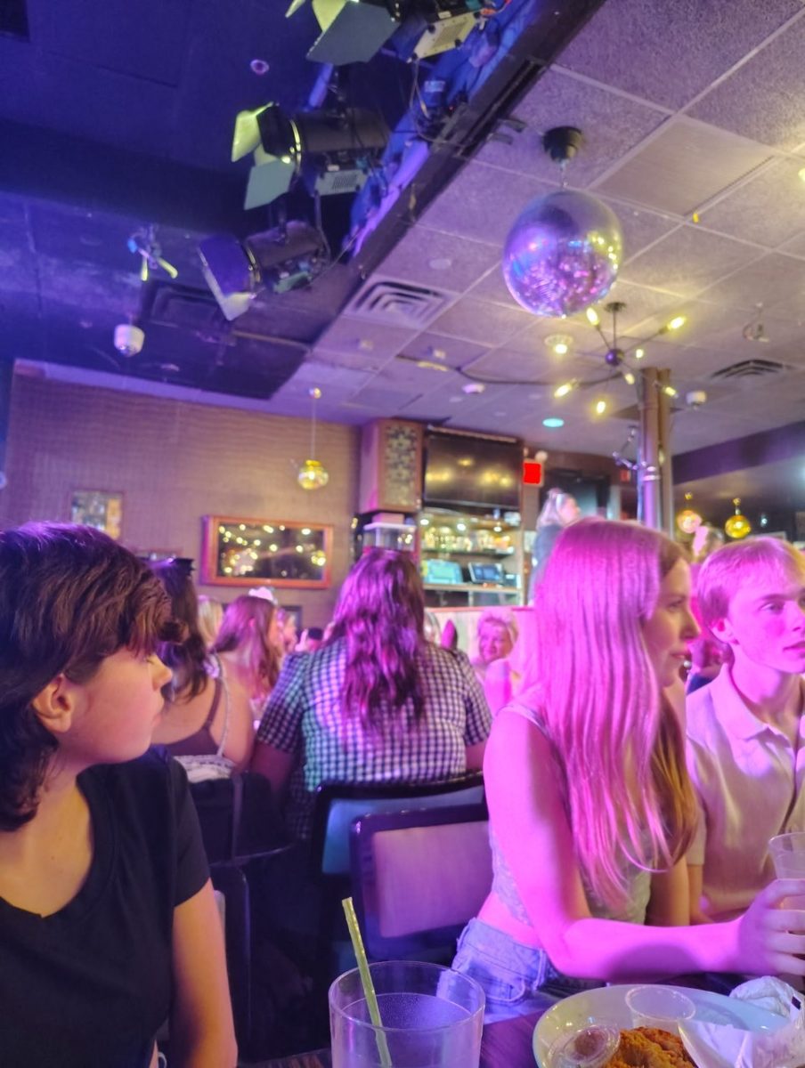 Us at Ellen's Stardust Diner. At this diner, Broadway performers that are in-between jobs will sing to you while you eat.